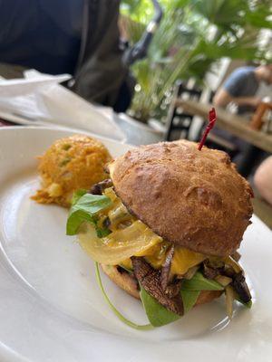 Spinach Chicken Burger - With spinach, cheddar, onions, mushrooms and cranberry chutney on a bun $14.95 +.95 for potato salad