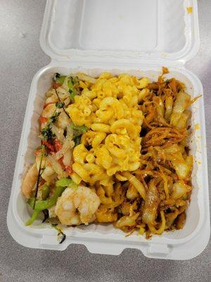 Garlic shrimp, Mac & cheese, sautéed cabbage.