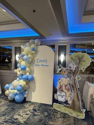 Balloon garland and custom backdrop both provided by Dream Factory.