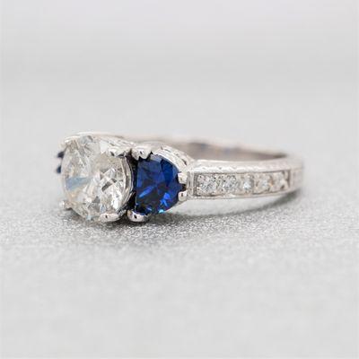 Check out brahimsjewelry.com for this sapphire and diamond engagement ring!