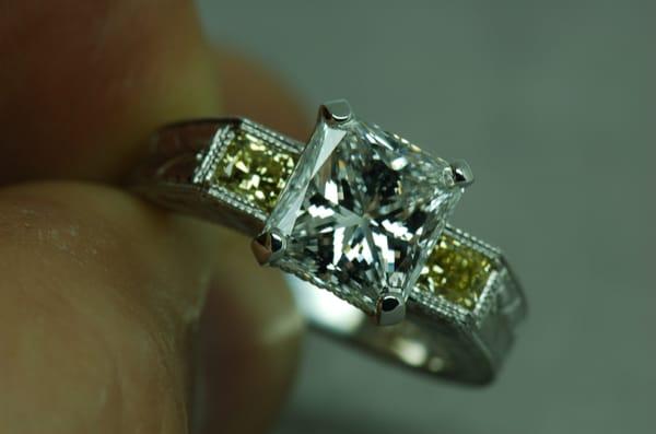 3 carat center Diamond with natural yellow accent Diamonds. Hand made at DeBoscq Fine Jewelry.