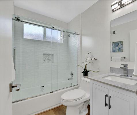 A newly updated small hall bathroom looking clean and bright.