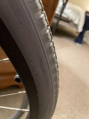 Wear on inside of tire from it rubbing on the frame.