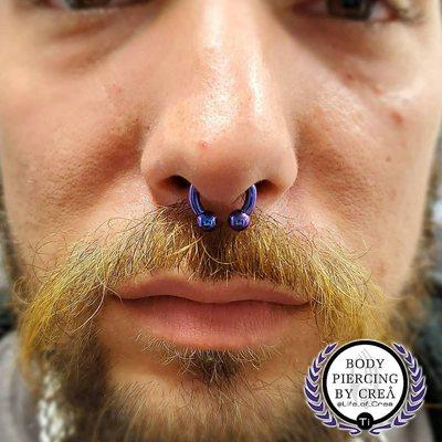 Large gauge septum piercing. Body Piercing by Crea at Z-Edge Tattoo and Body Piercing in Sarasota