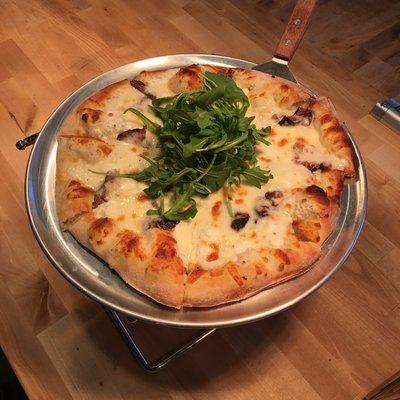 Goat Hollow pizza, featuring  Risin' Creek Creamery goat cheese.