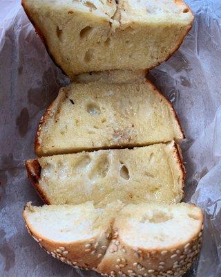 Sesame seed bagel toasted with butter.