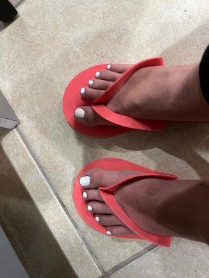 Deluxe pedicure ($45), regular white polish