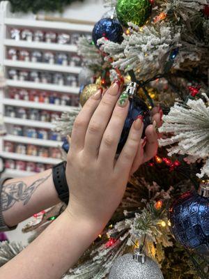 Red sparkle French tip with Christmas tree accent nails :)