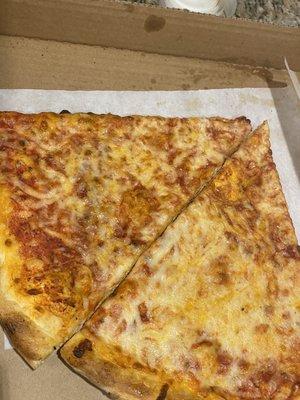 Cheese pizza with overcooked cheese