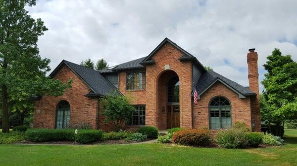 New CertainTeed Landmark Pro roof in Moire Black along with new seamless aluminum gutters.