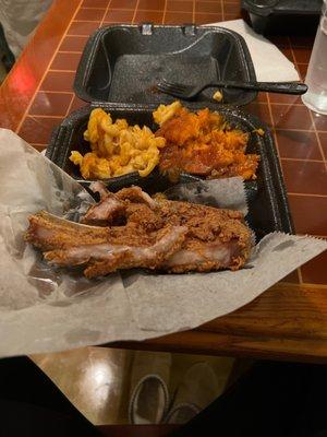 Pork chop with mac n cheese and candied yams