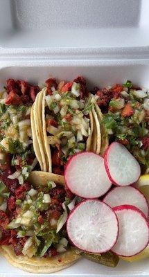 Tacos al pastor salsa verde fresh tacos not spicy came out nice and hot my first time and will come again