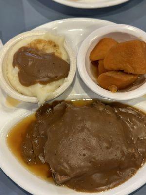 Pot roast with mashers and yams.