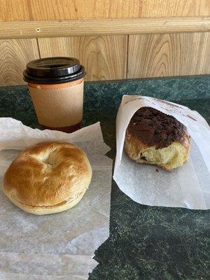 Vanilla cappuccino, plain bagel with cream cheese, donut