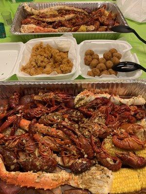 king crab leg, snow crab legs, crawfish, fried calamari & hush puppies