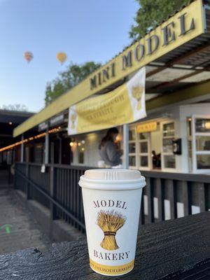 Cappuccino and air balloon watching