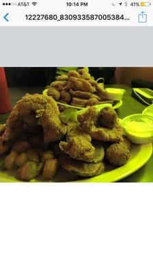 Mountains of food. Catfish, okra and fried potatoes.