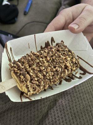 Banana Paleta with full dip milk chocolate and peanuts