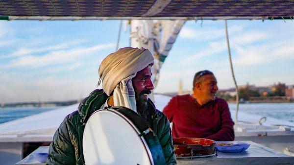 Nubian singers perform aboard traditional Felucca sailboats on the Nile