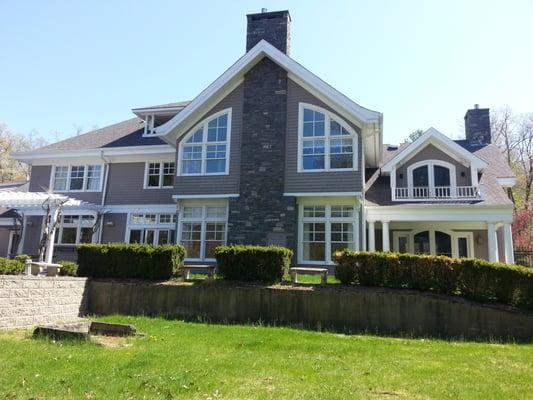 6" high capacity gutters and down spouts installed on this large homes.