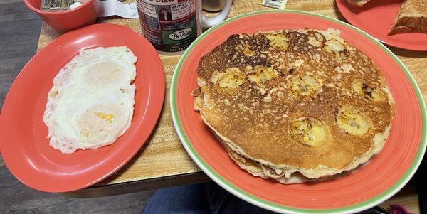 Loaded pancakes with bananas and 2 eggs