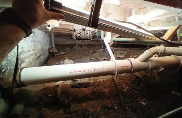 Crawl space repiping the main sewer line