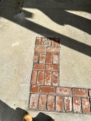 Brick Ribbons installed after area drains have been installed