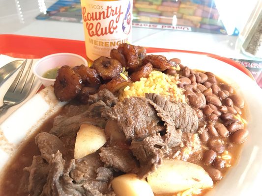 Beef with potatoes, with a side of beans and rice and sweet plantains!