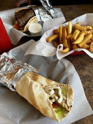 Chicken wrap, fries, gyro wrap