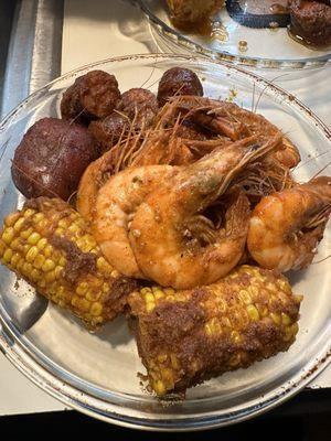 Shrimp, sausage, corn and potatoes in house special sauce with medium heat