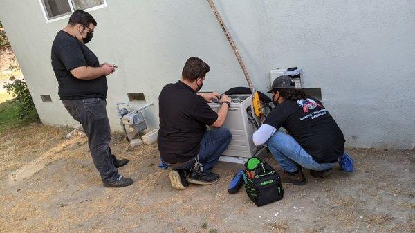 Ben and his team checking out what part of my unit needed to be replaced.