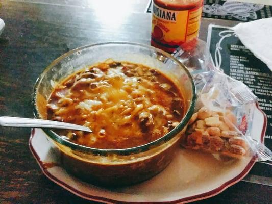 Bowl of chili with cheese, onions, and macaroni. Hearty and pretty good!