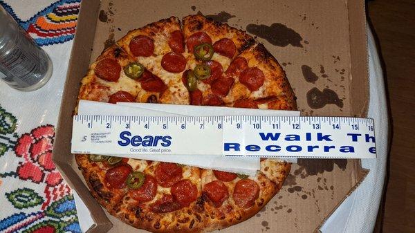 Large pizza, measures 12 inches.