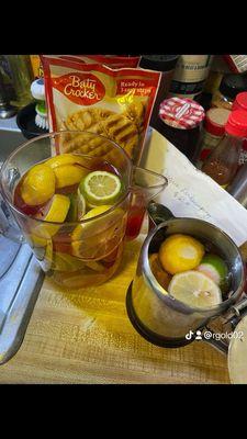 Infused water with lemons, limes & cherries