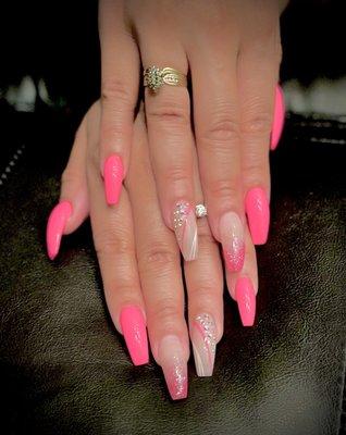 Pink acrylic nails with designs