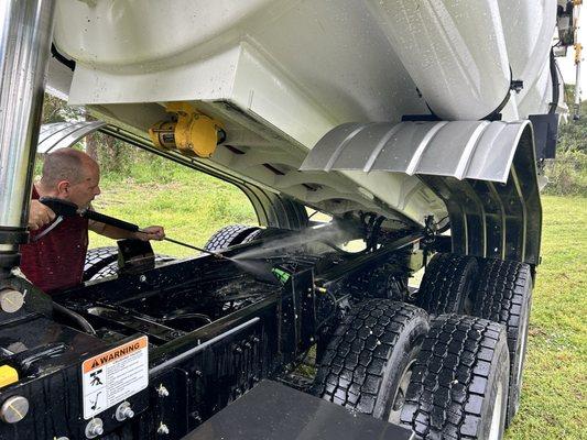 Cleaning our vac truck.