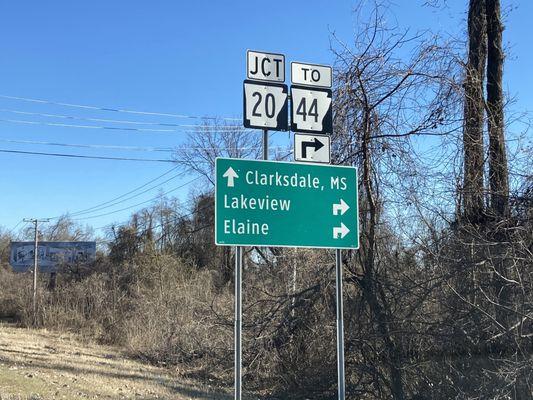 roadway signage indicating that the AR Welcome Center is located near the eastern border of Arkansas, adjacent to Mississippi