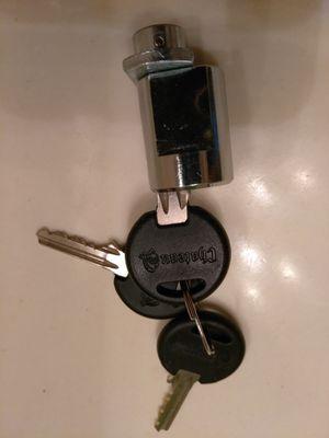 My awesome lock, complete with three keys, now useless.  Maybe jewelry?