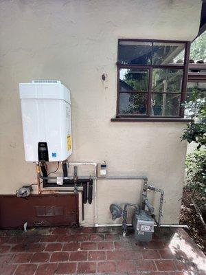 Navien Tankless water heater exterior installation.