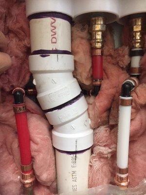 First time - lots of elbows and no insulation on back side of hot water pex tubing.