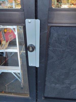 Commercial mortise lock repair and latch guard replacement.