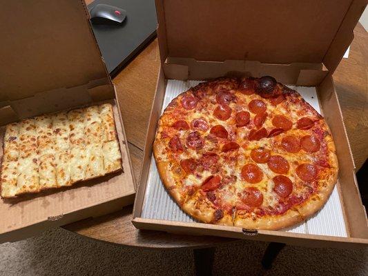 Large pizza and cheese bread