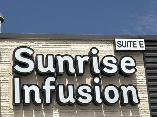 Sunrise Infusion sign and Suite Letter