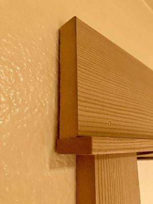 Cheap trim everywhere. It swells up at the slightest hint of moisture. They use it in the bathrooms/showers.