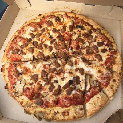 $7.99 lg two topping pizza Mushrooms and sausage 12 uneven slices