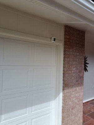 They replaced the gasket around the garage door and painted the garage door itself properly.