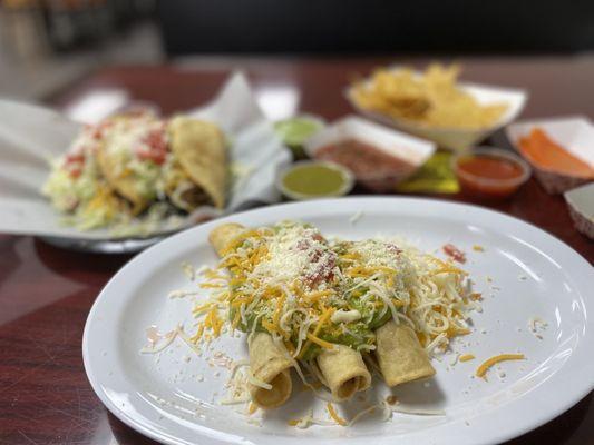 Three rolled tacos, two crispy shredded beef tacos. Awesomeness on a plate.