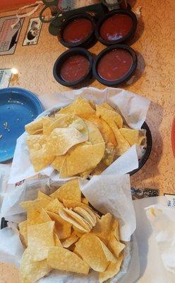 2 adults, a 4 year old, and a 2 year old. 2 chips, 4 salsas. Sorry I asked for some chips when I saw others eating them, and I had none.