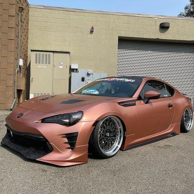 Full color change on this Toyota 86 along with accents and window tints!