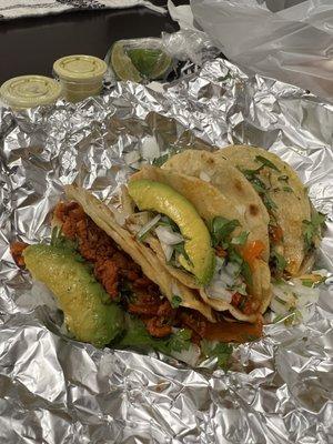 Al pastor tacos with avocado